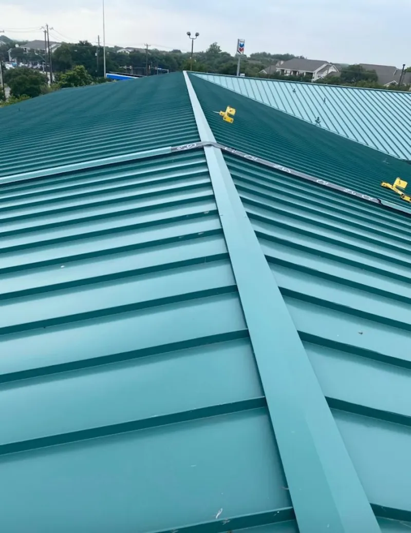 Green commercial metal roof ridge and valley for Metal Roof Repair in Southold